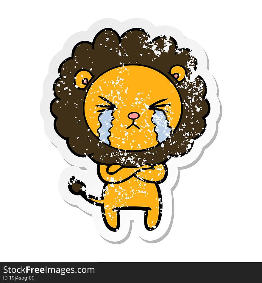 distressed sticker of a cartoon crying lion with crossed arms