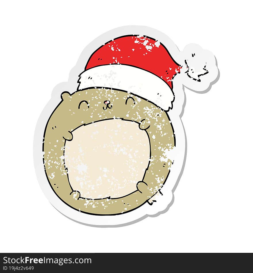 distressed sticker of a cute cartoon christmas bear