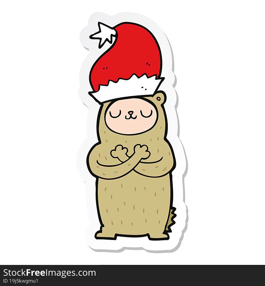 sticker of a cartoon bear wearing christmas hat