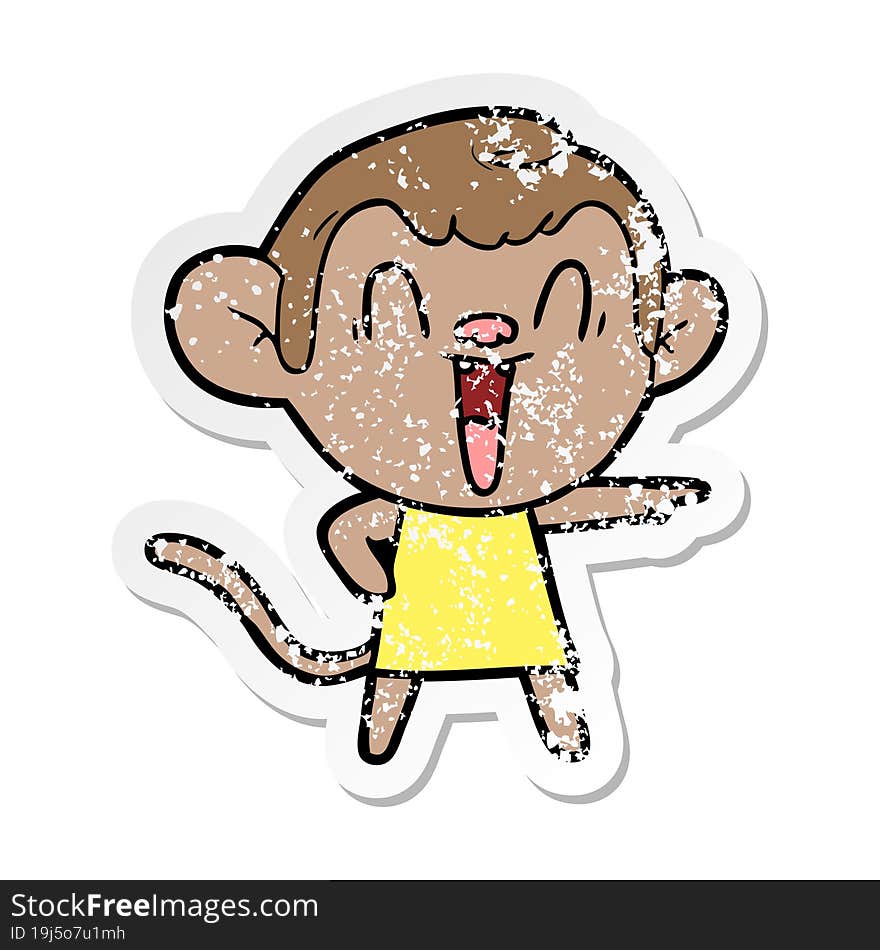 distressed sticker of a cartoon laughing monkey