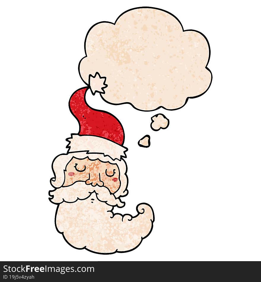 cartoon santa face with thought bubble in grunge texture style. cartoon santa face with thought bubble in grunge texture style