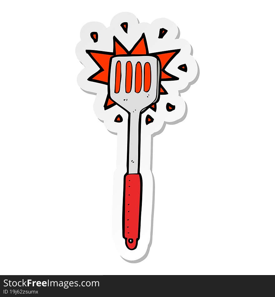 sticker of a cartoon kitchen spatula