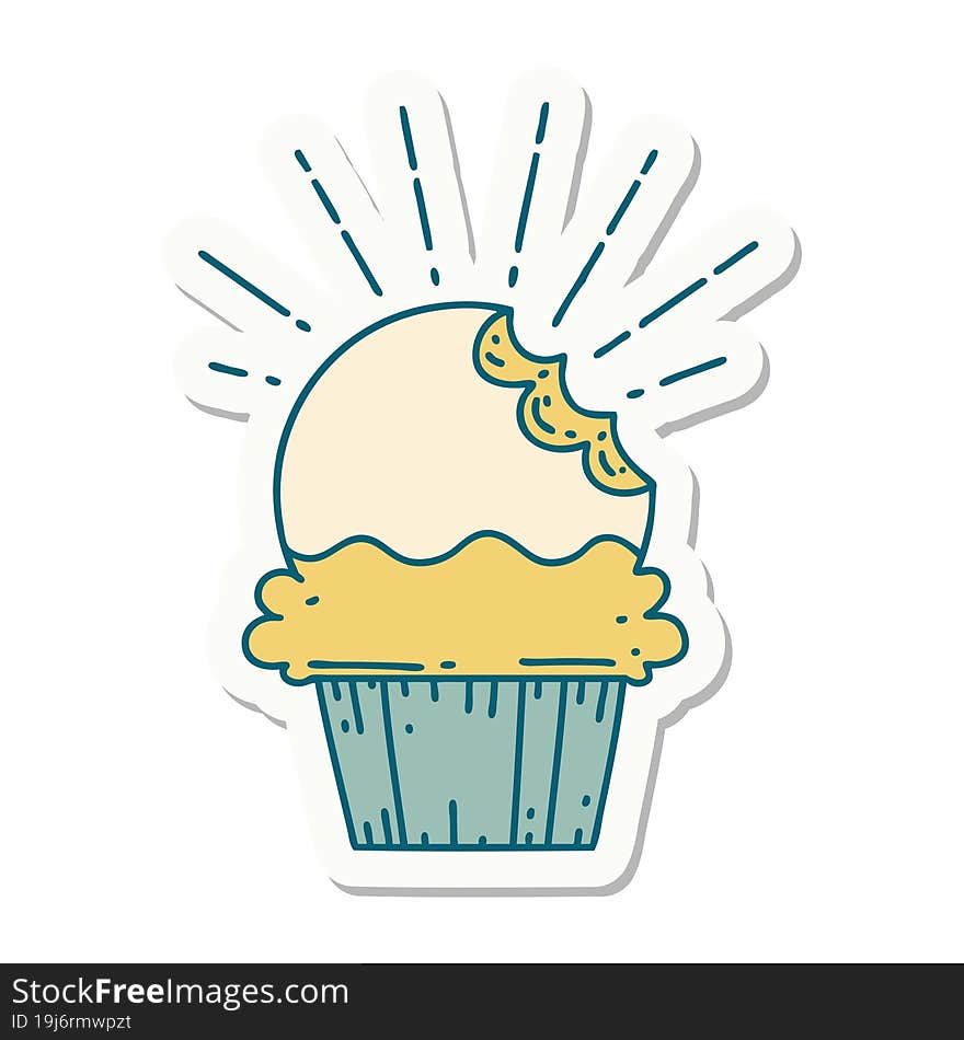 sticker of a tattoo style cupcake with missing bite