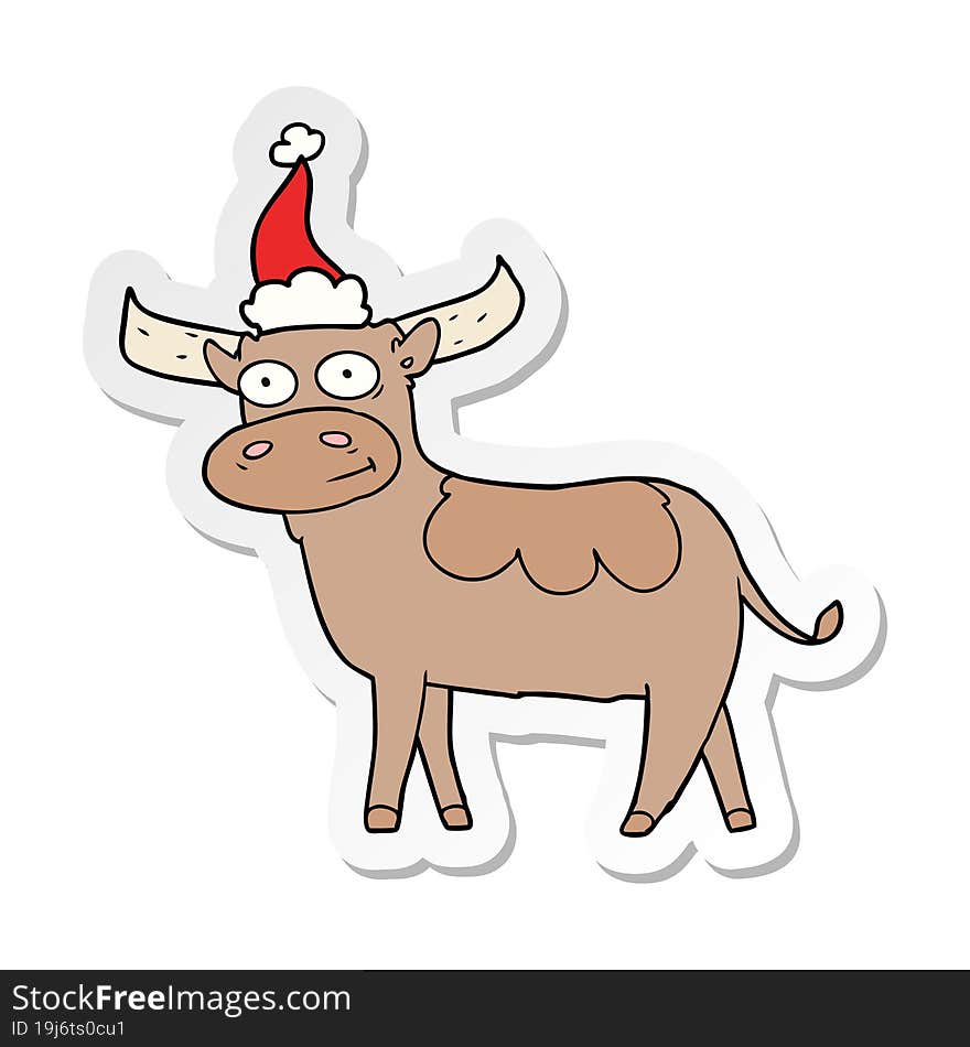 hand drawn sticker cartoon of a bull wearing santa hat