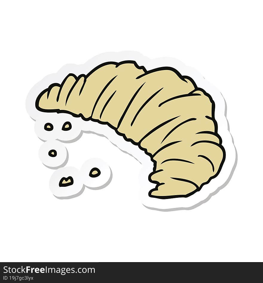 sticker of a cartoon croissant