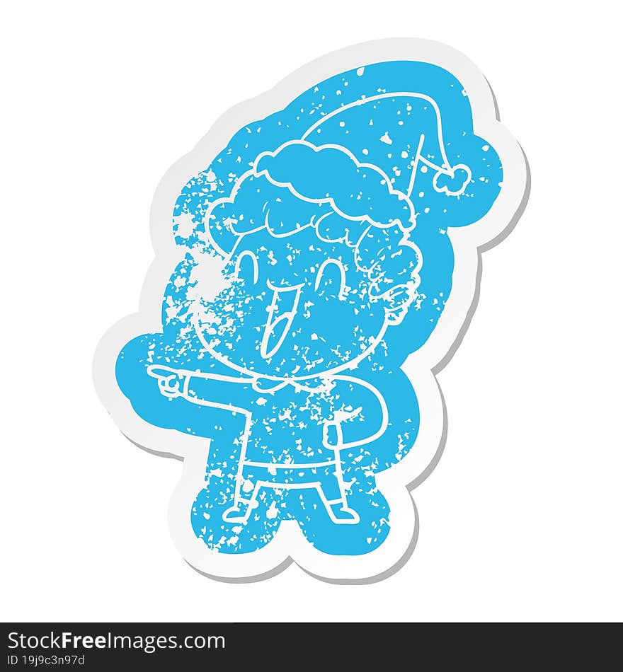 cartoon distressed sticker of a happy man wearing santa hat