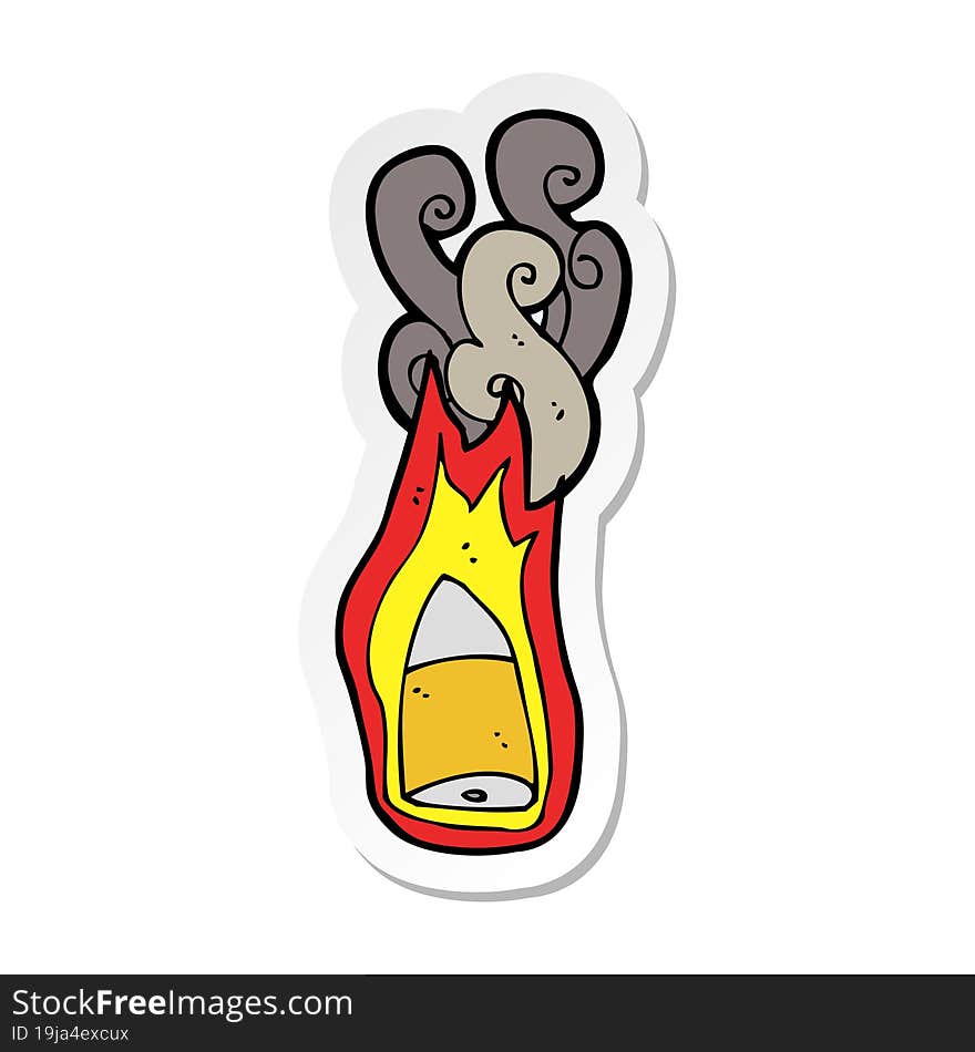 sticker of a cartoon flaming bullet