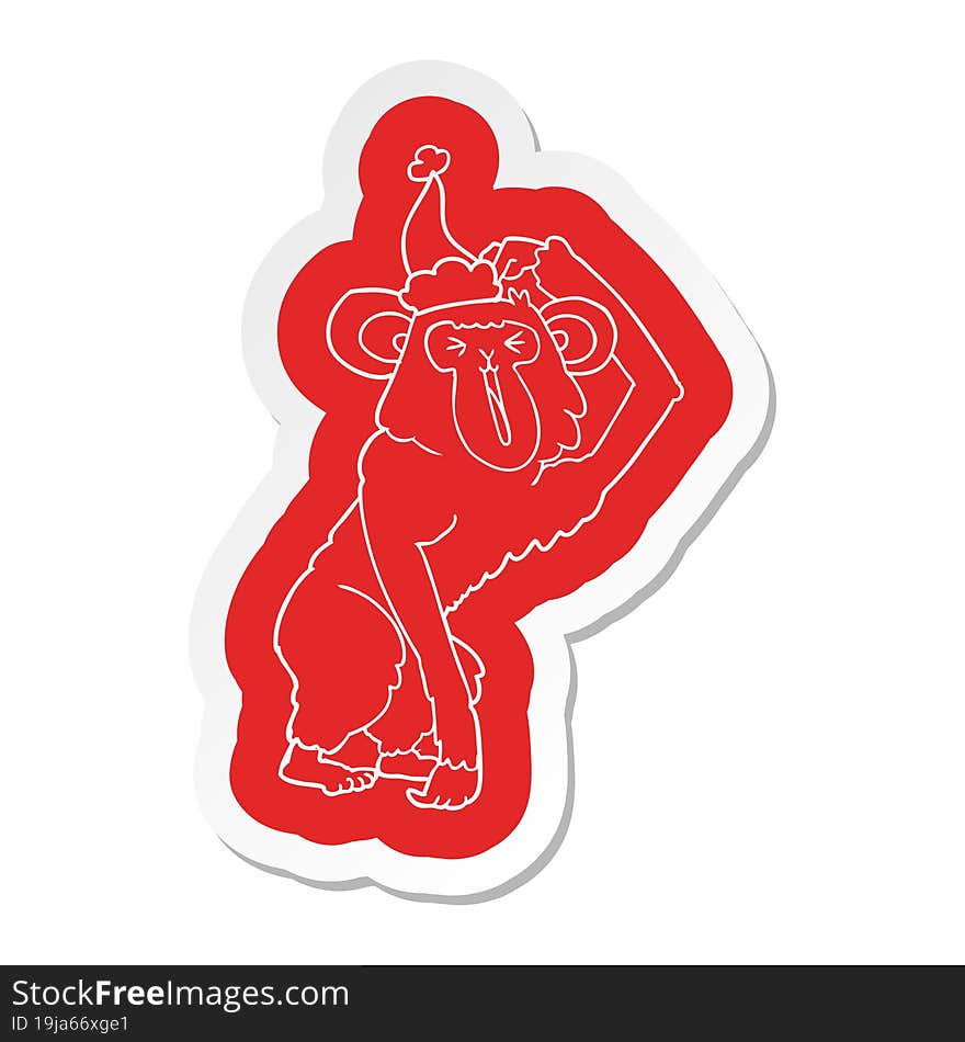 cartoon  sticker of a chimp scratching head wearing santa hat