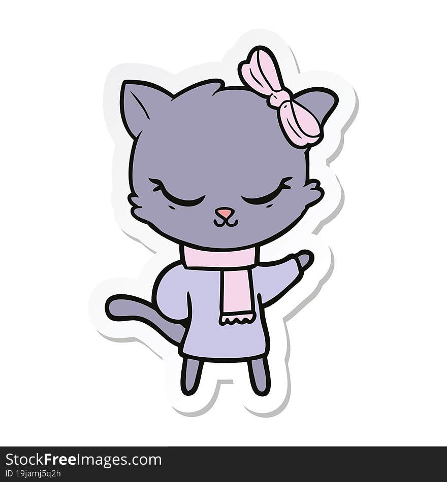 sticker of a cute cartoon cat with bow