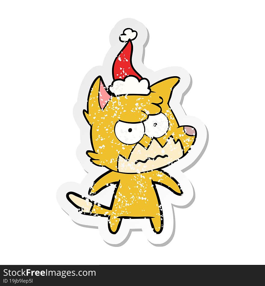 distressed sticker cartoon of a annoyed fox wearing santa hat