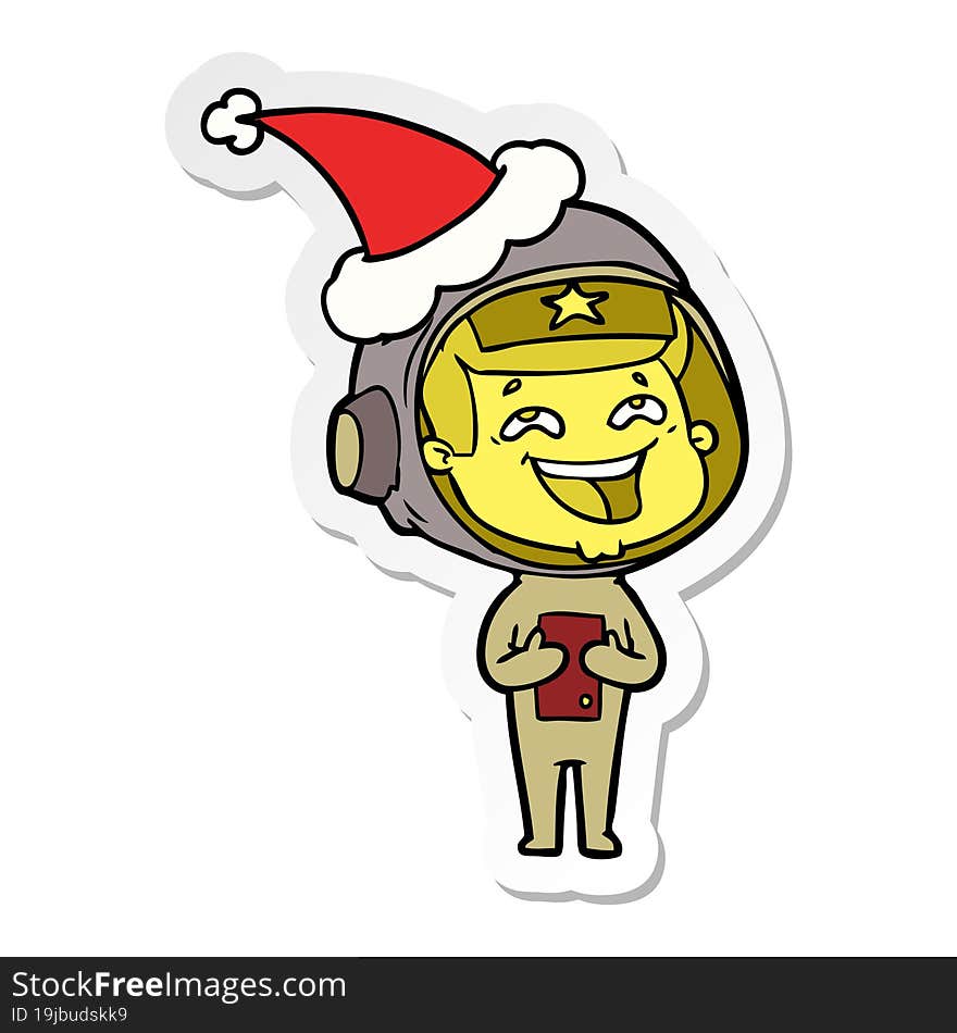 Sticker Cartoon Of A Laughing Astronaut Wearing Santa Hat