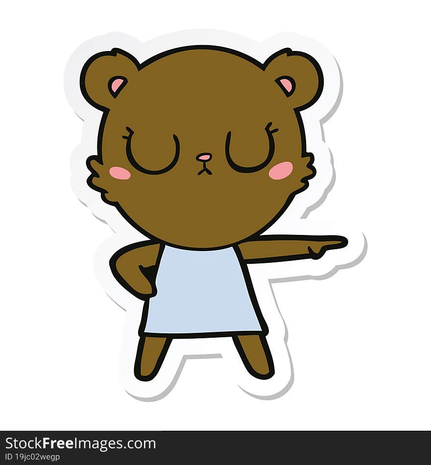 sticker of a peaceful cartoon bear in dress pointing