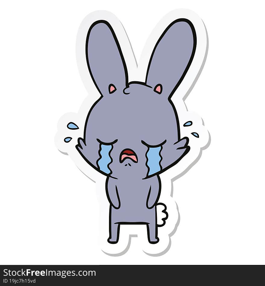 sticker of a cute cartoon rabbit crying