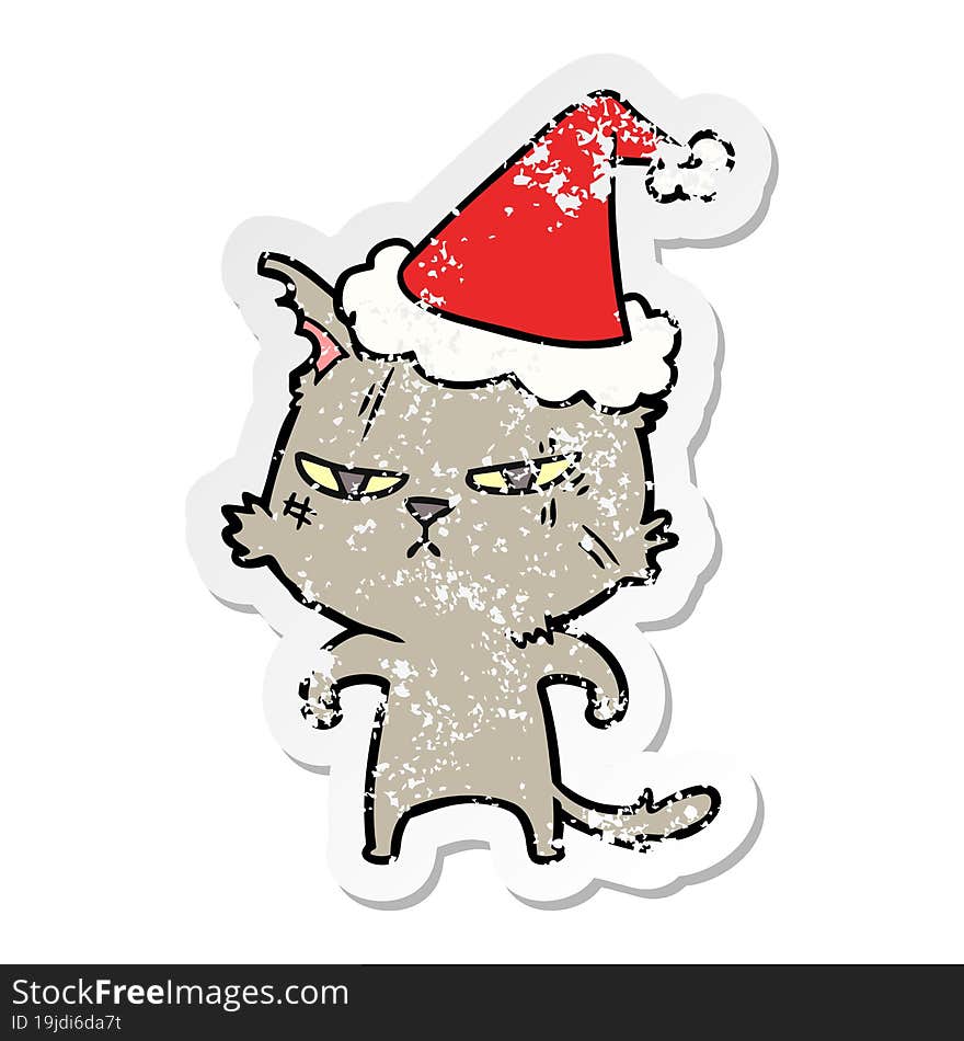 tough distressed sticker cartoon of a cat wearing santa hat