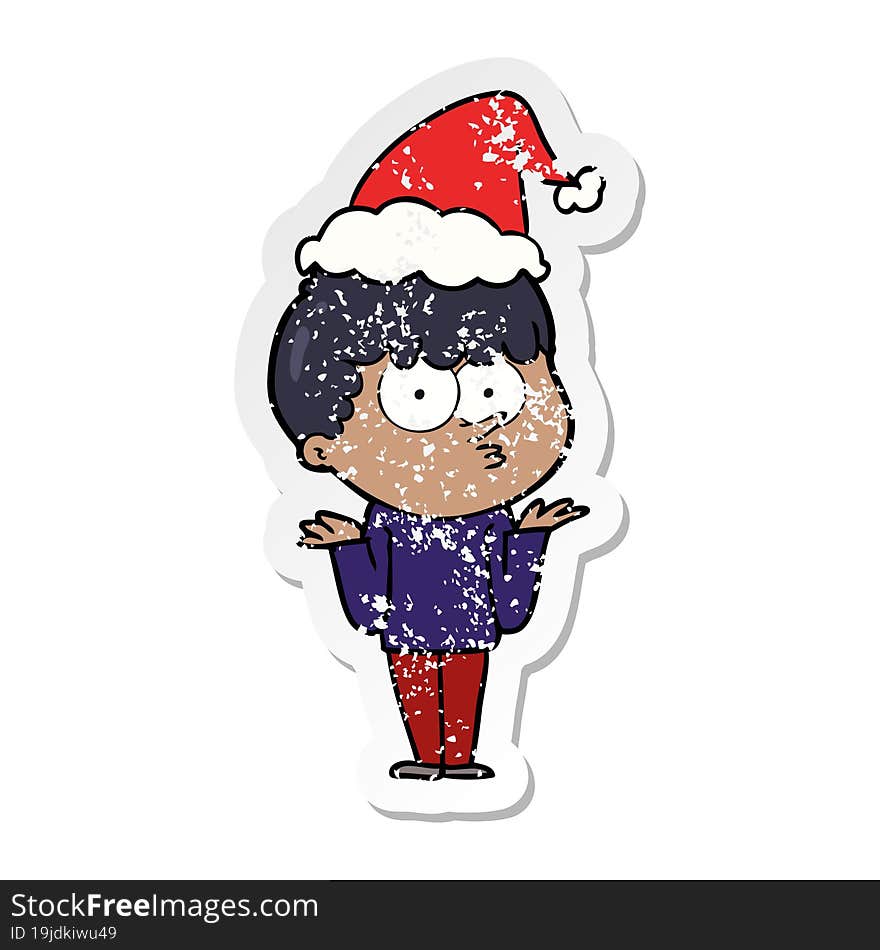 Distressed Sticker Cartoon Of A Curious Boy Shrugging Shoulders Wearing Santa Hat