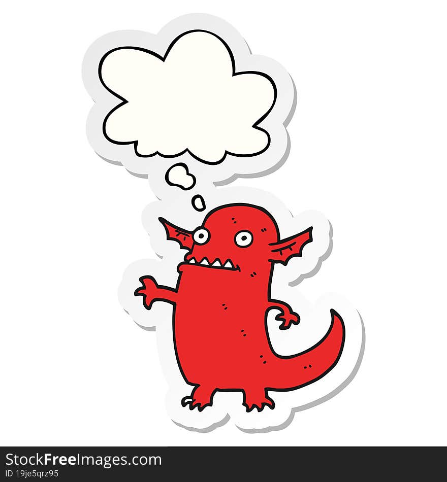 cartoon halloween monster with thought bubble as a printed sticker