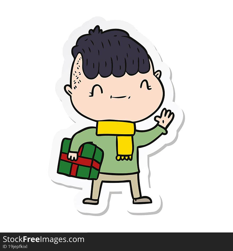 Sticker Of A Cartoon Friendly Boy With Christmas Present