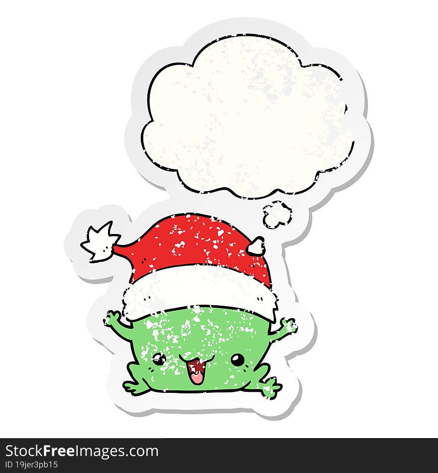 cute cartoon christmas frog with thought bubble as a distressed worn sticker