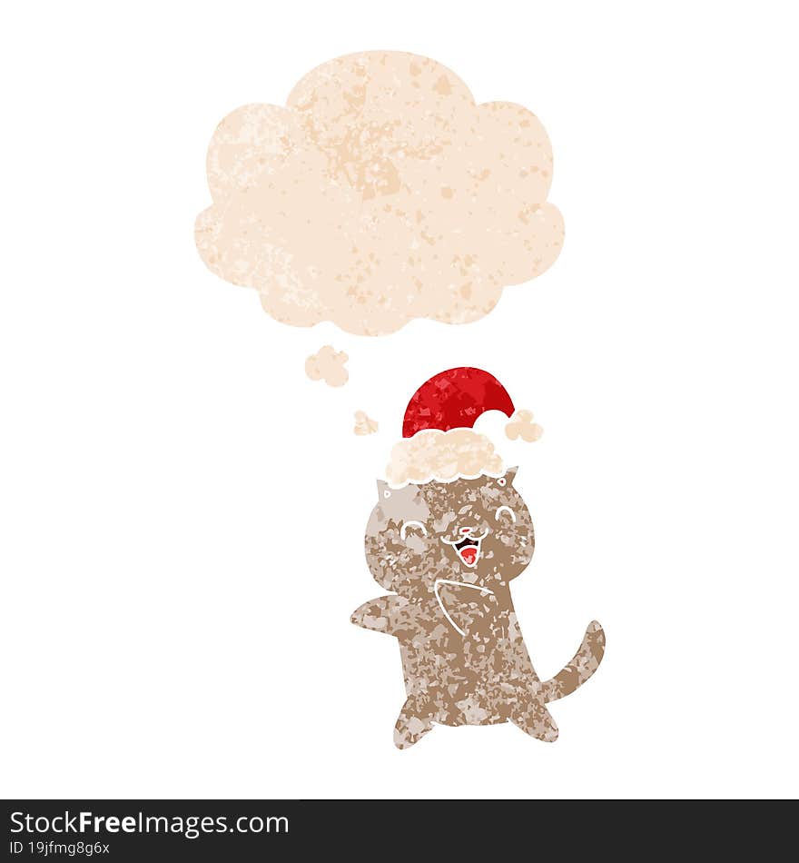 cute cartoon christmas cat with thought bubble in grunge distressed retro textured style. cute cartoon christmas cat with thought bubble in grunge distressed retro textured style