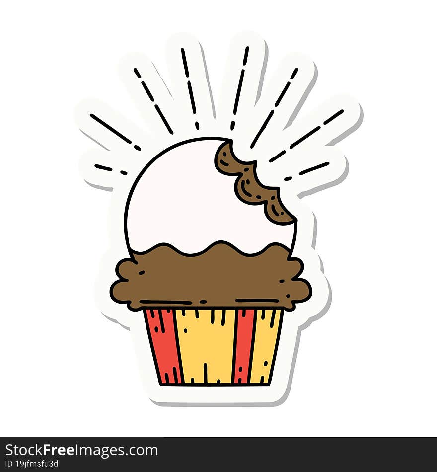 sticker of tattoo style cupcake with missing bite