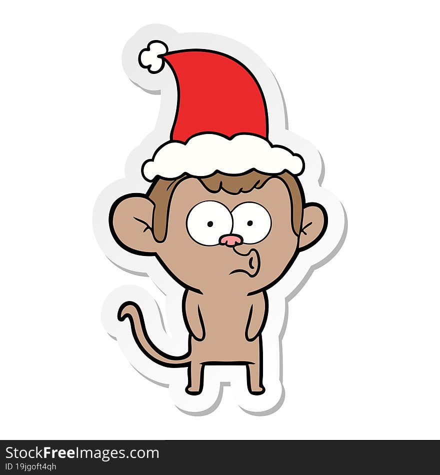 sticker cartoon of a hooting monkey wearing santa hat