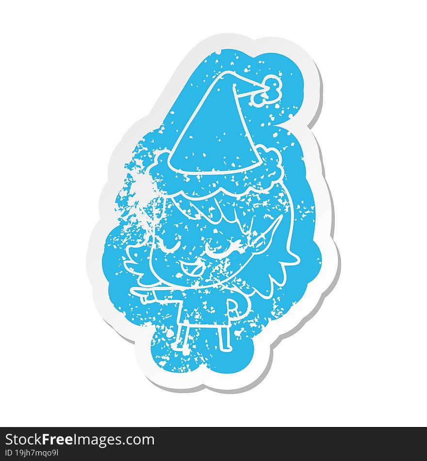 Happy Cartoon Distressed Sticker Of A Elf Girl Pointing Wearing Santa Hat