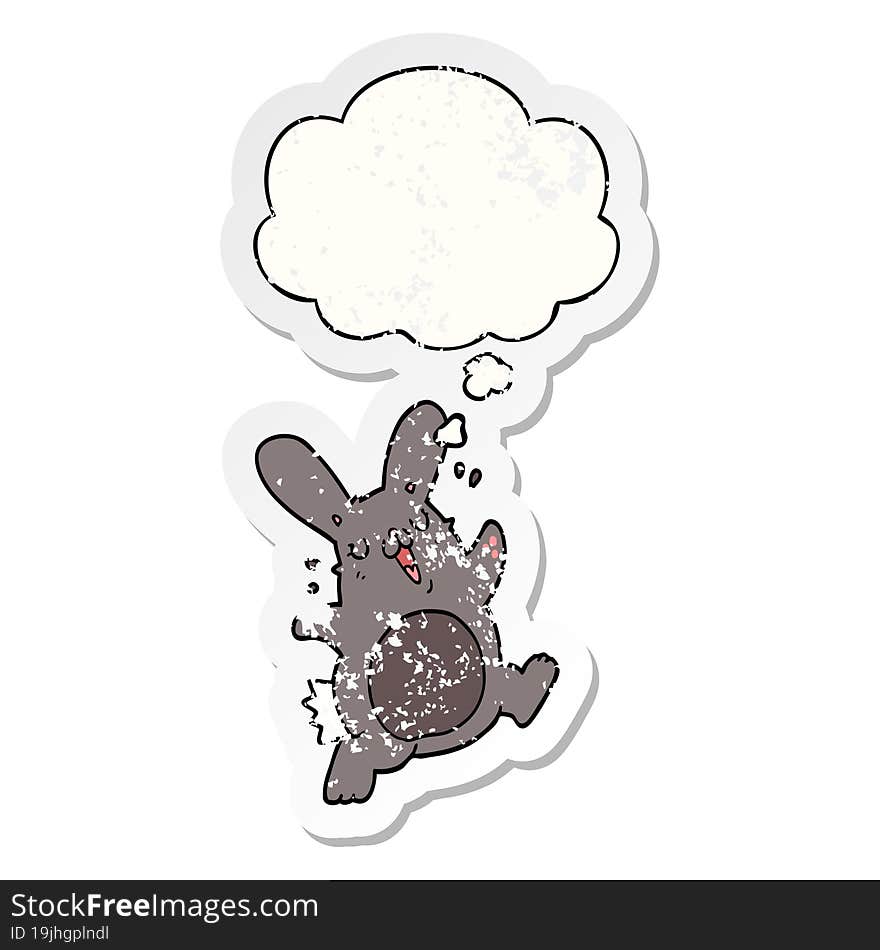 cartoon rabbit and thought bubble as a distressed worn sticker