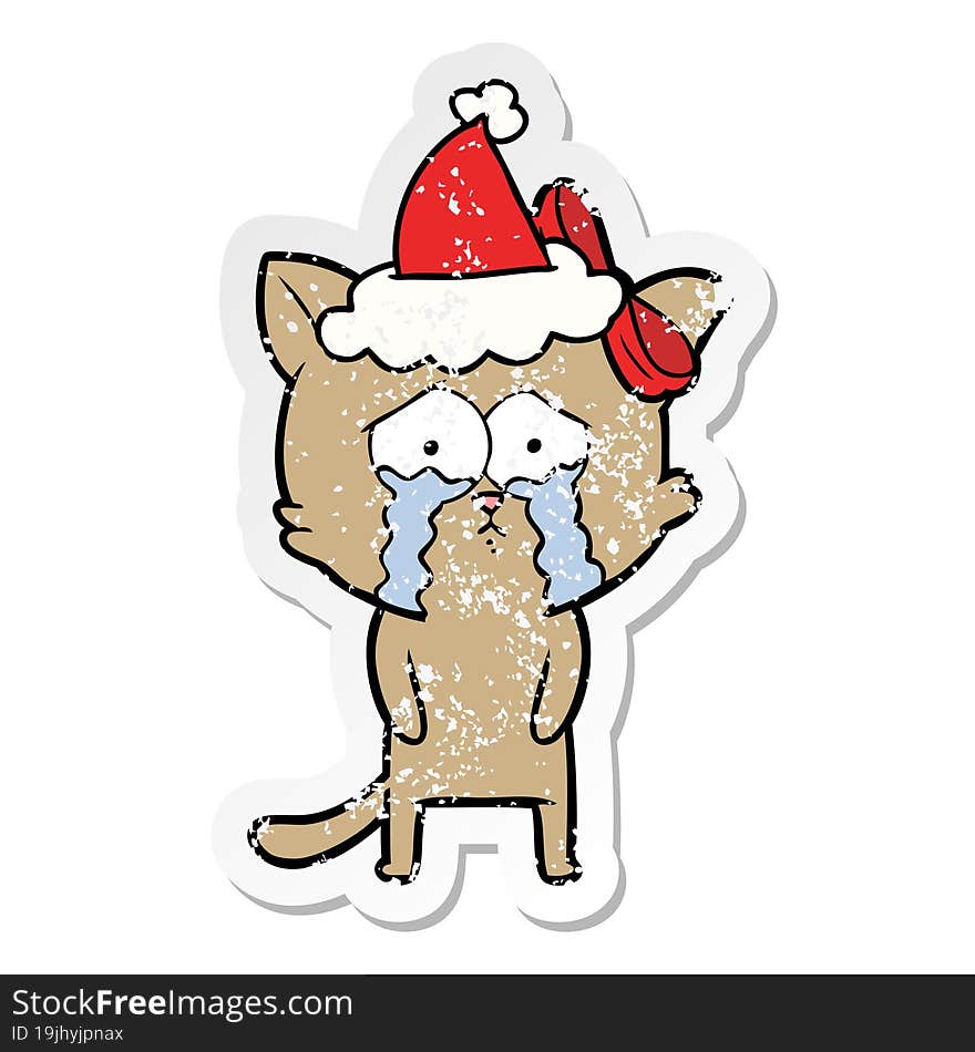 distressed sticker cartoon of a cat wearing santa hat