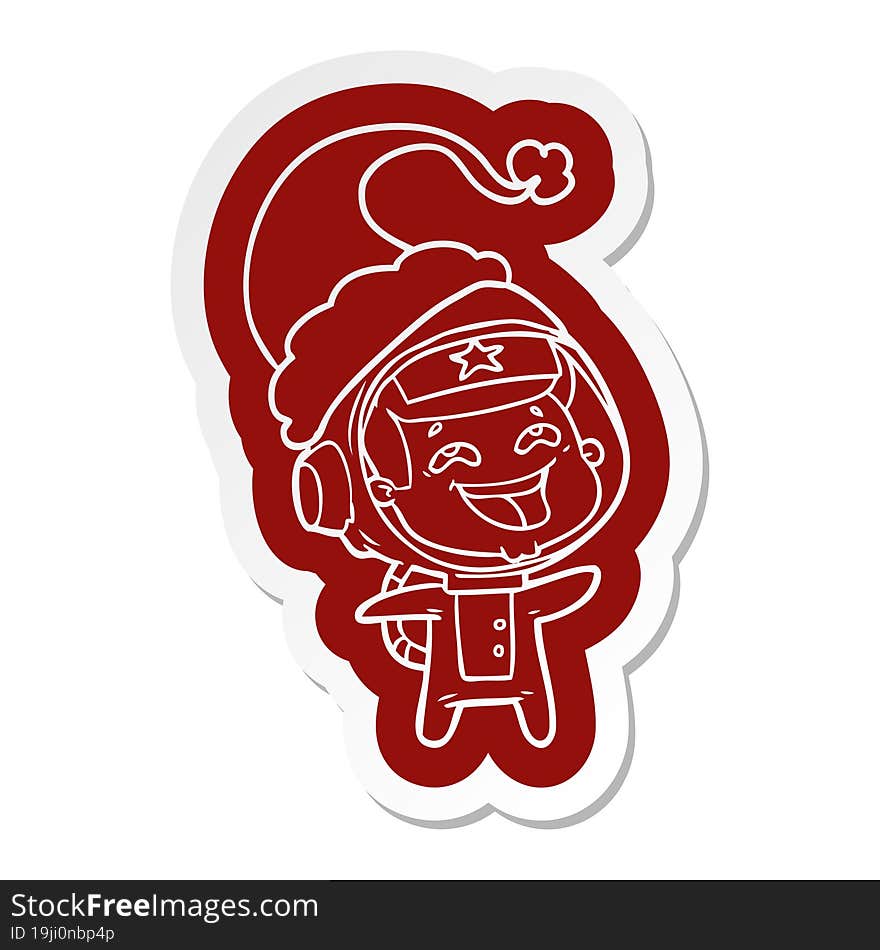 Cartoon  Sticker Of A Laughing Astronaut Wearing Santa Hat