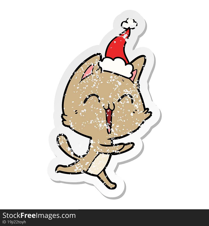 Happy Distressed Sticker Cartoon Of A Cat Meowing Wearing Santa Hat