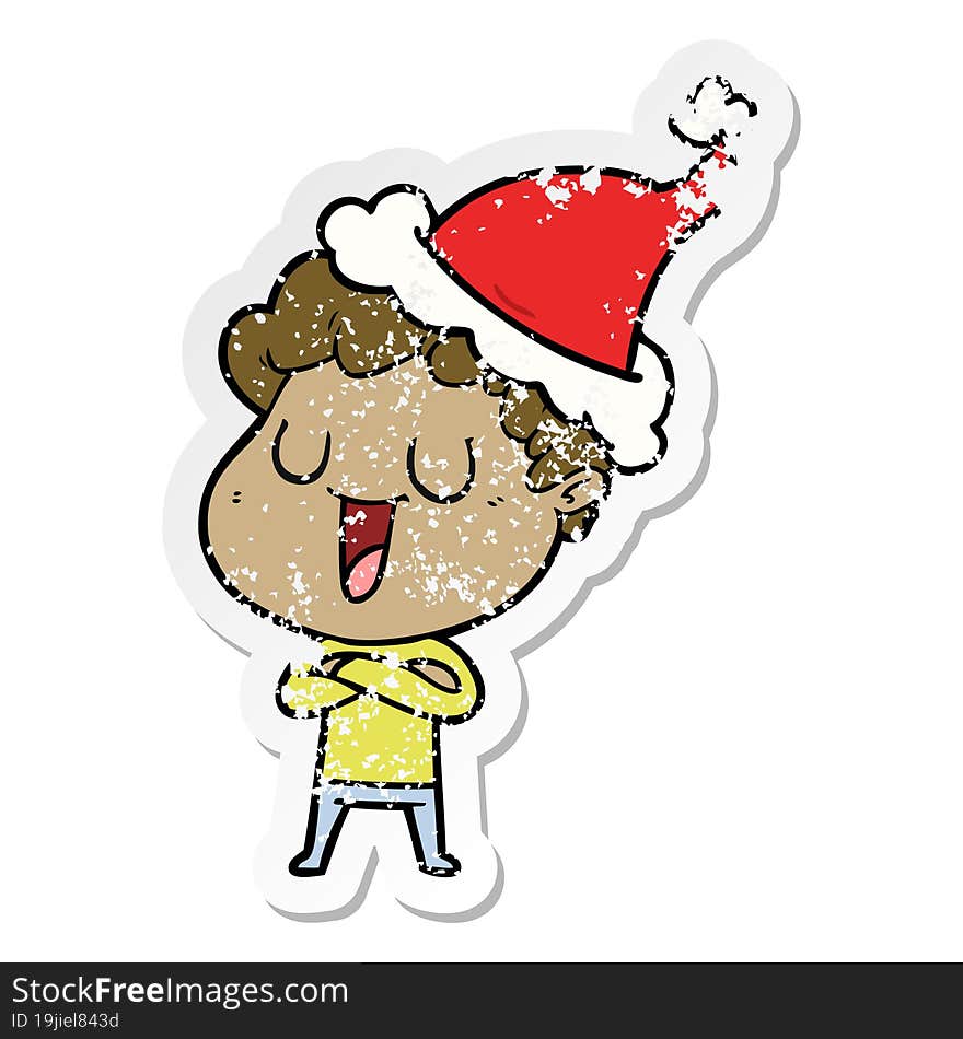 laughing distressed sticker cartoon of a man wearing santa hat