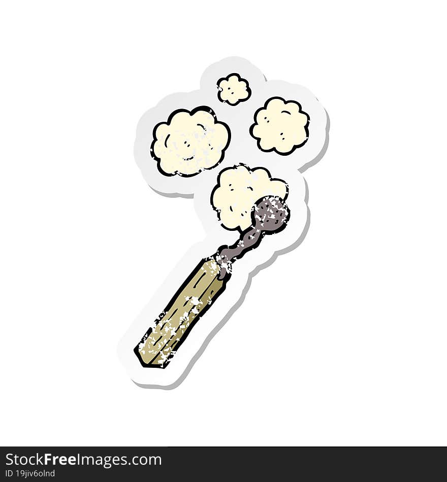 retro distressed sticker of a cartoon burnt match