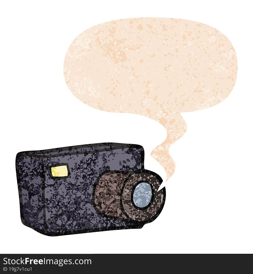 Cartoon Camera And Speech Bubble In Retro Textured Style