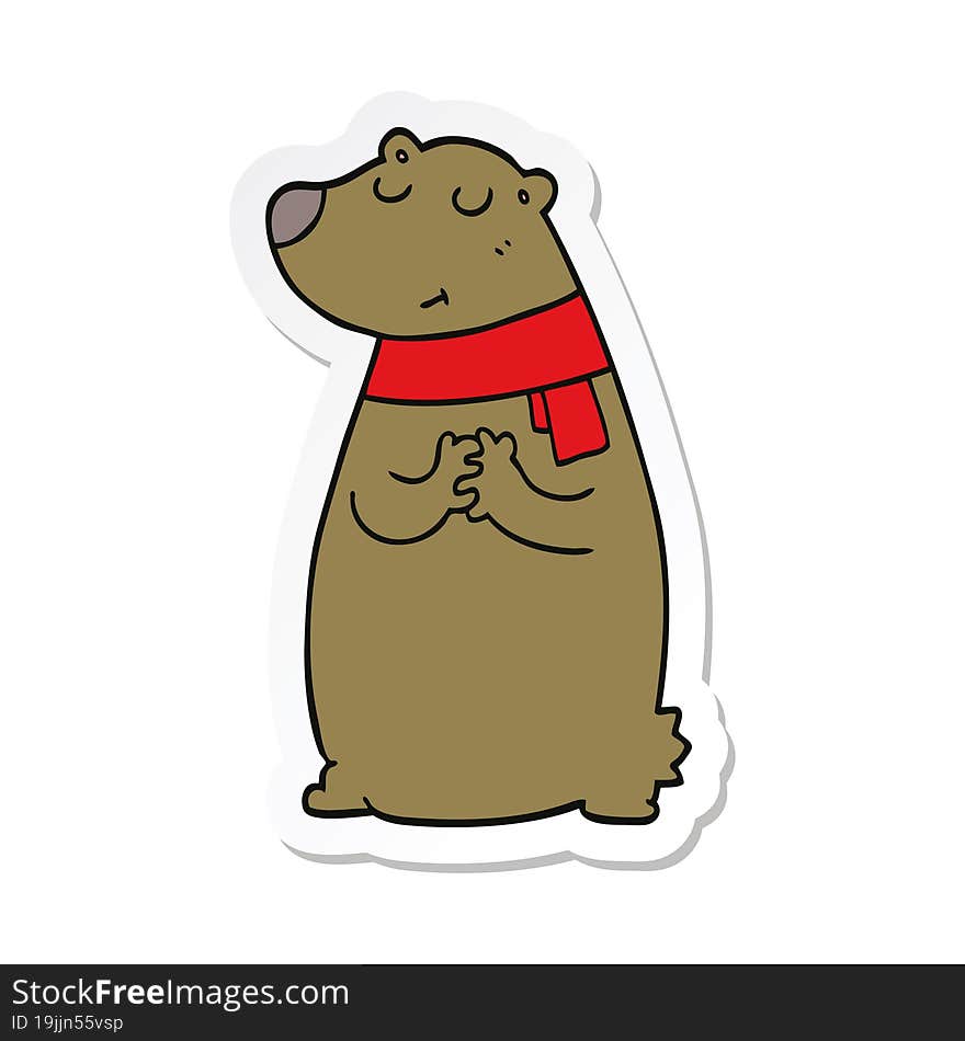 sticker of a cartoon bear wearing scarf