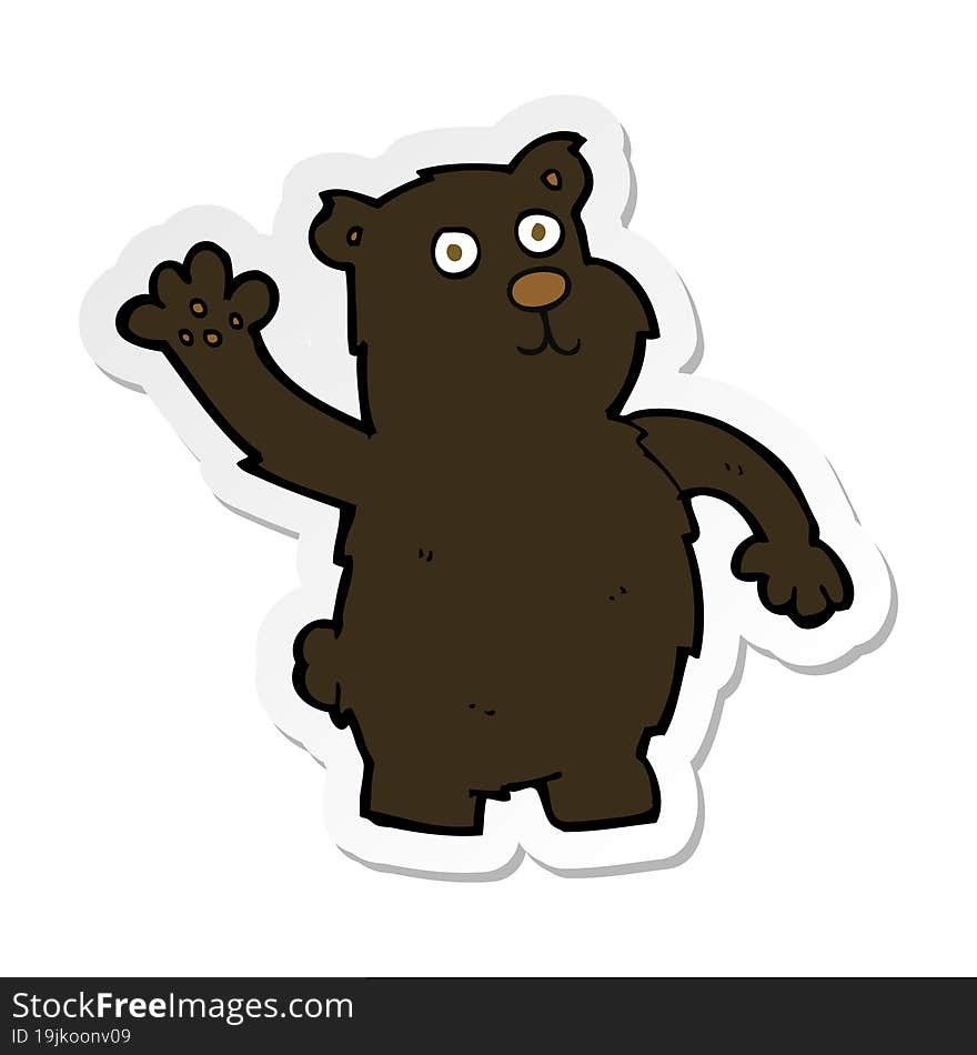 sticker of a cartoon waving black bear