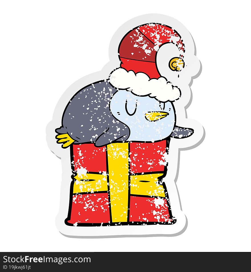 Distressed Sticker Of A Cartoon Penguin Wearing Christmas Hat