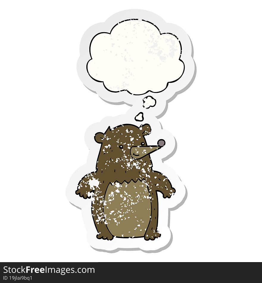 cartoon bear and thought bubble as a distressed worn sticker