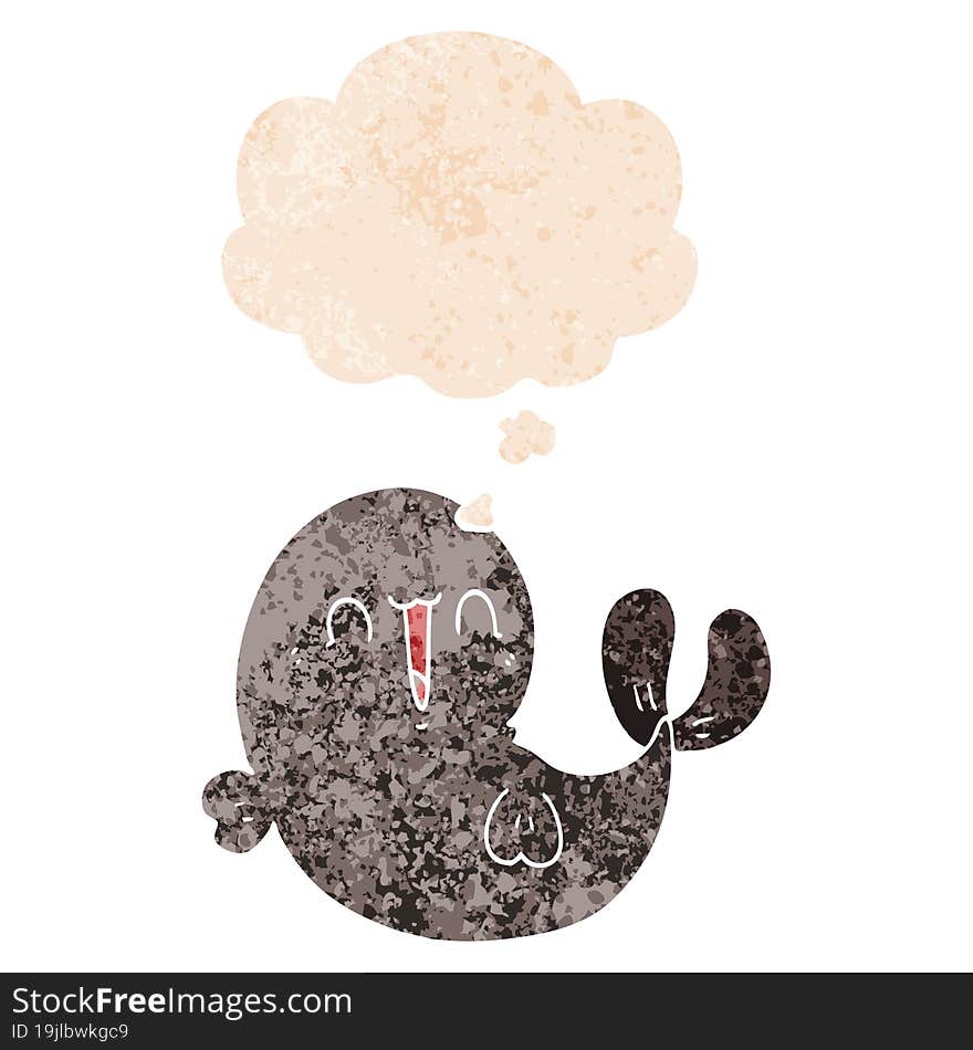 cute cartoon whale and thought bubble in retro textured style