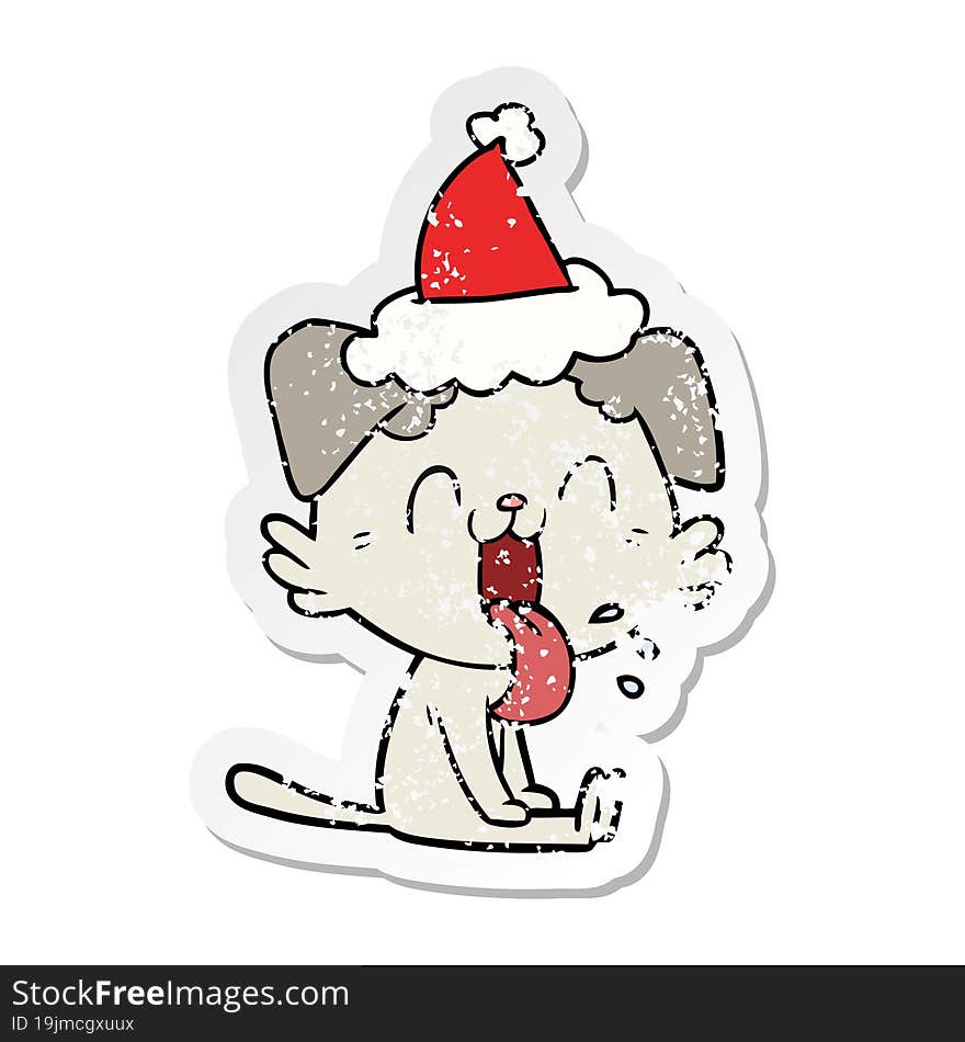 distressed sticker cartoon of a panting dog wearing santa hat