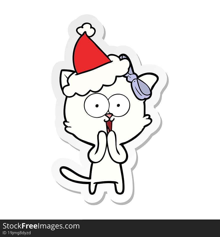 hand drawn sticker cartoon of a cat wearing santa hat