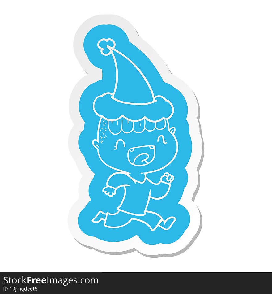 cartoon  sticker of a happy boy laughing and running away wearing santa hat