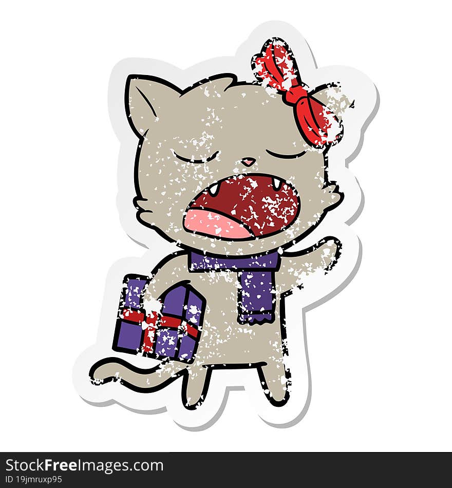 distressed sticker of a cartoon cat with christmas present