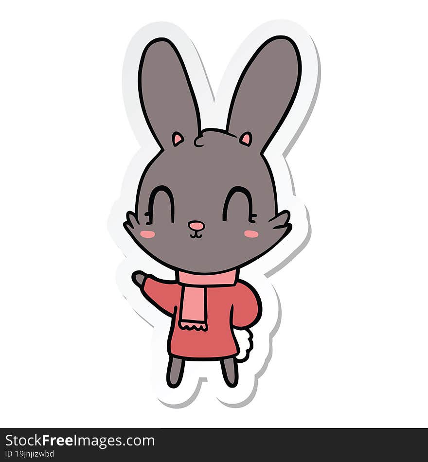 sticker of a cute cartoon rabbit wearing clothes