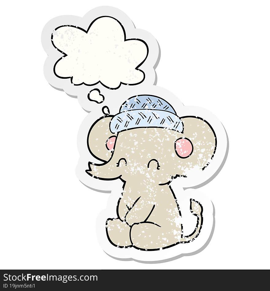 cartoon cute elephant and thought bubble as a distressed worn sticker