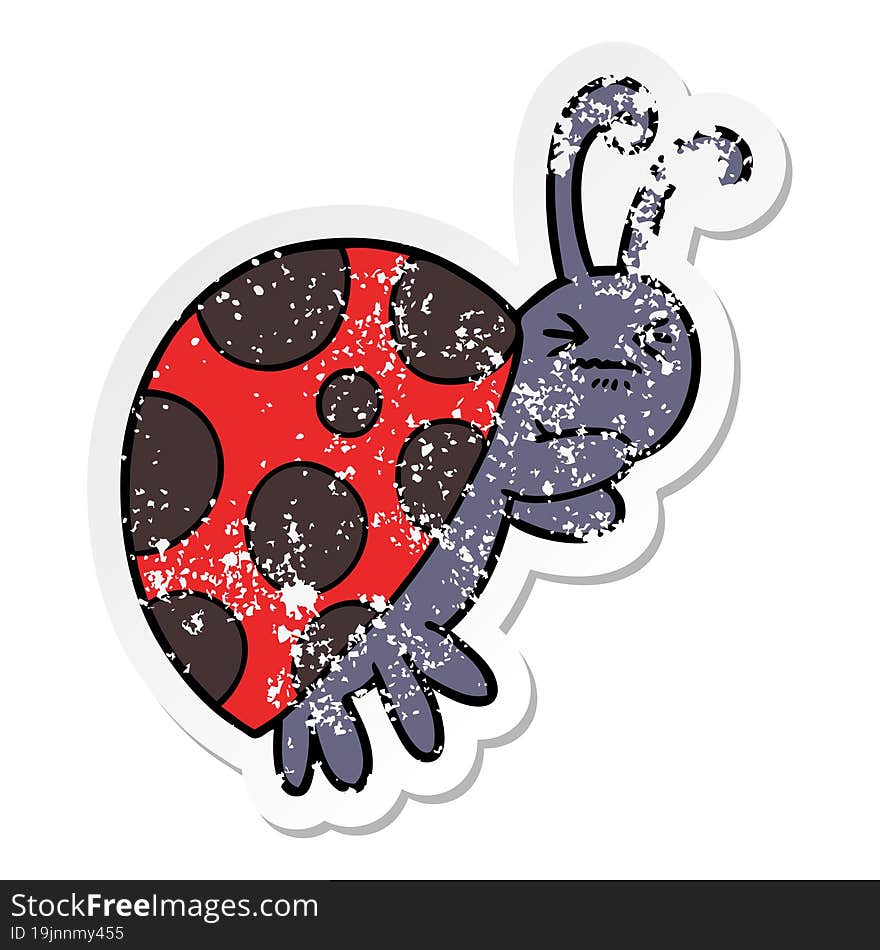 distressed sticker of a cartoon ladybug