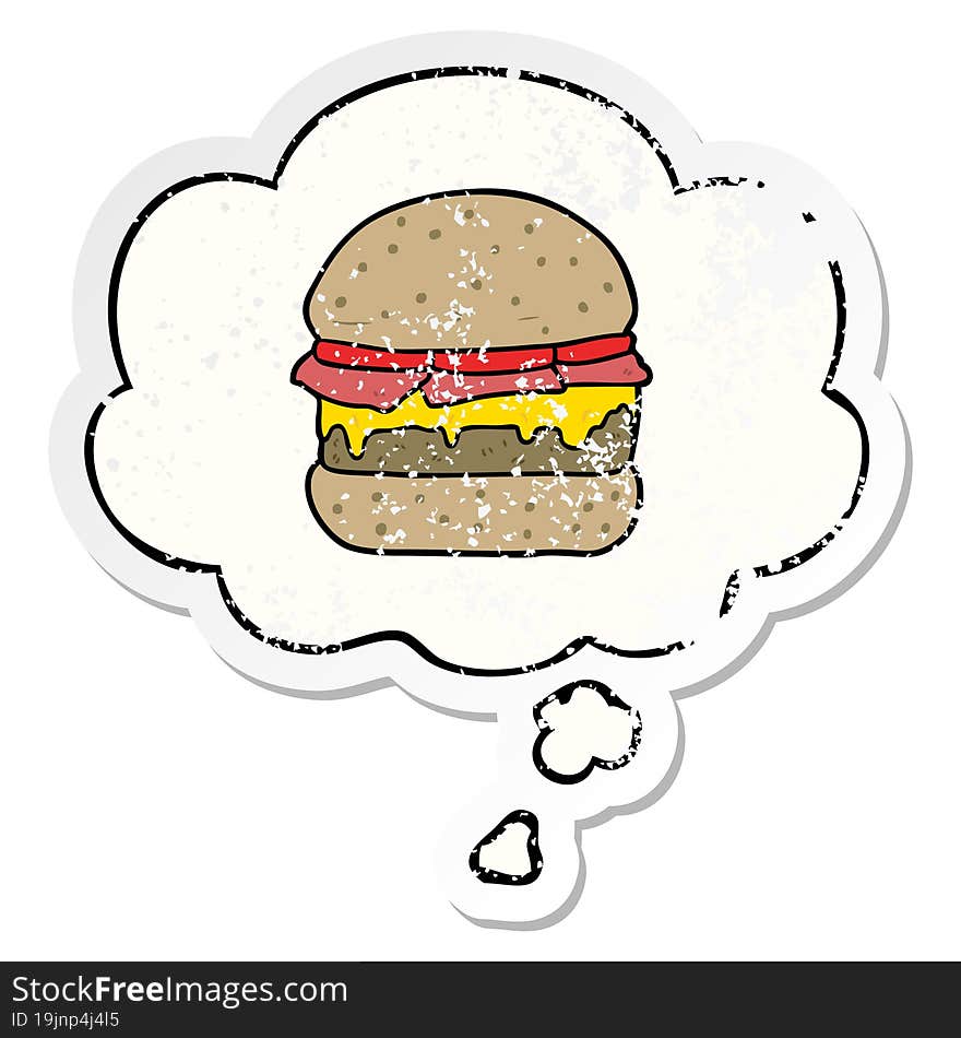 cartoon burger and thought bubble as a distressed worn sticker