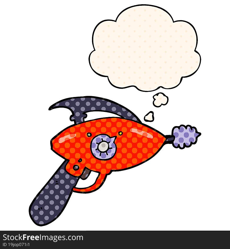 cartoon ray gun and thought bubble in comic book style