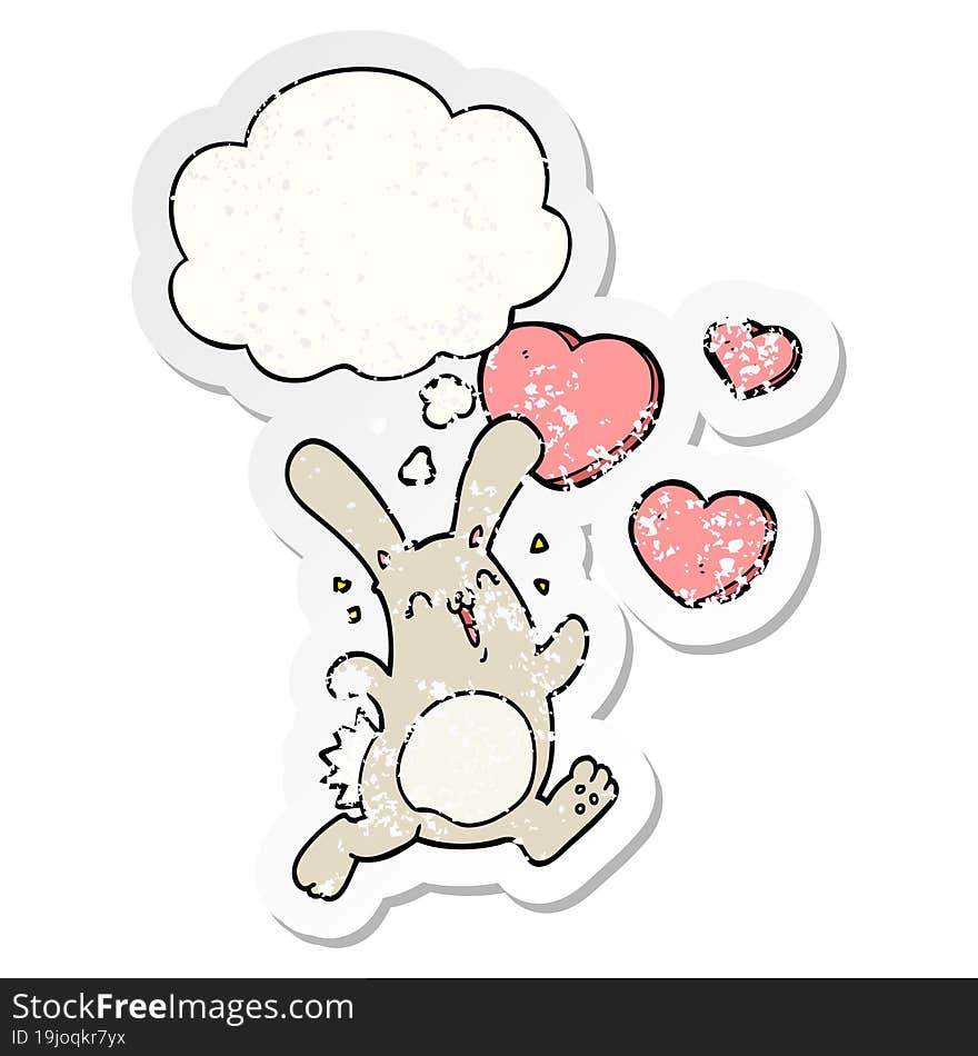 cartoon rabbit in love and thought bubble as a distressed worn sticker