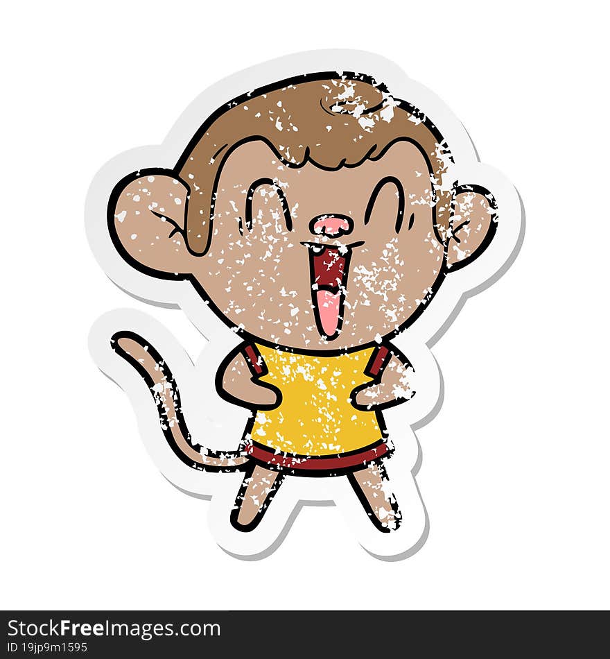 distressed sticker of a cartoon laughing monkey