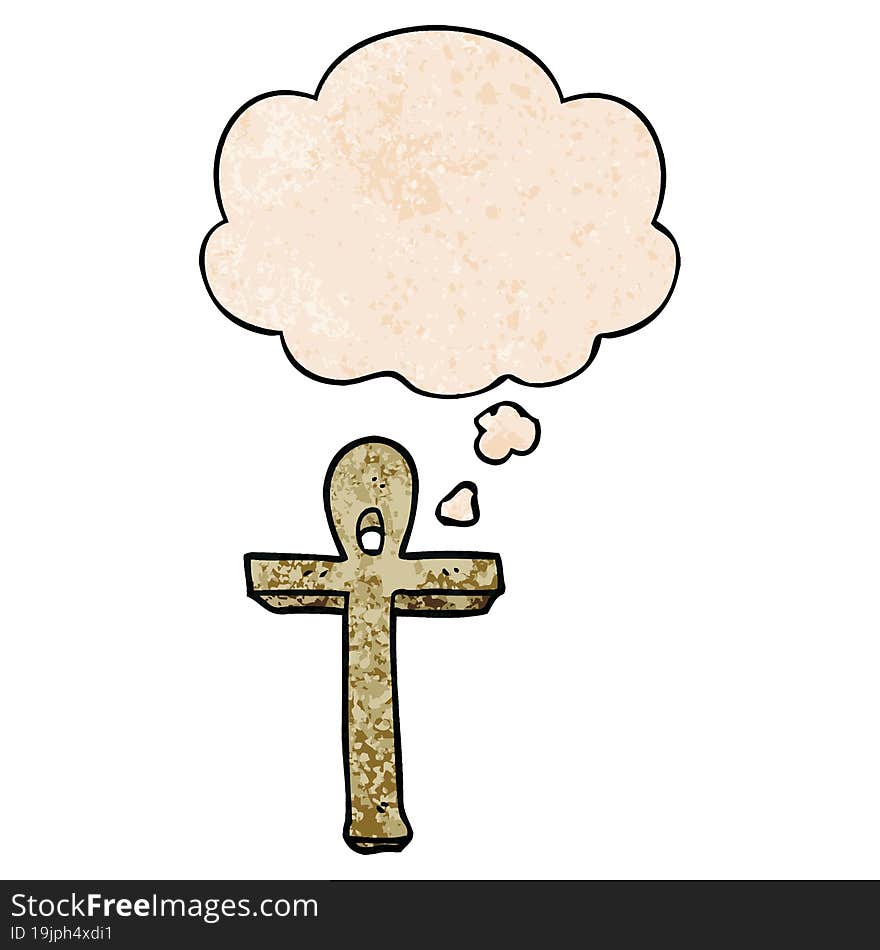 cartoon ankh symbol and thought bubble in grunge texture pattern style